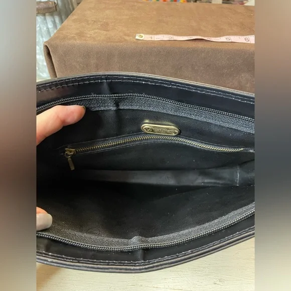 Mario Valentino Black and Gold Clutch with Elegant Wristlet